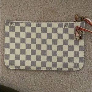 Louis Vuitton wristlet (not 100%)